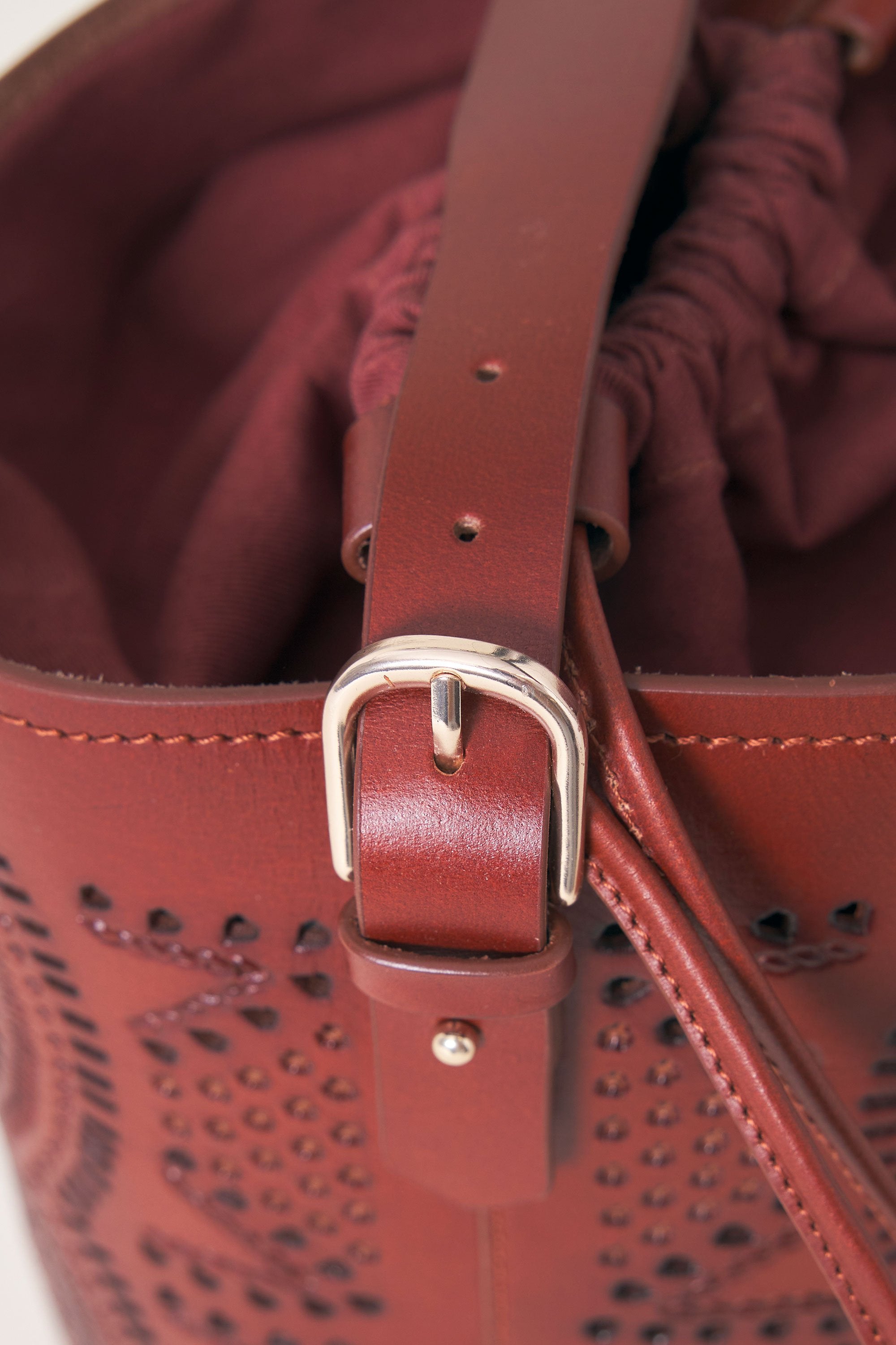 Lace-style leather openwork bucket bag Galy
