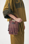 Kleine handgeflochtene Lederhandtasche Meryl